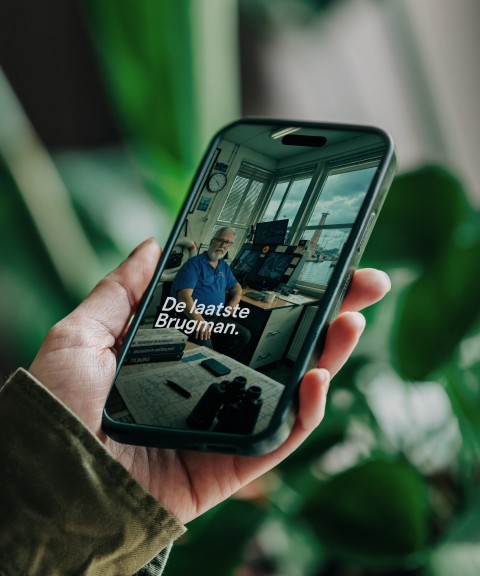 Foto van gsm met reclame